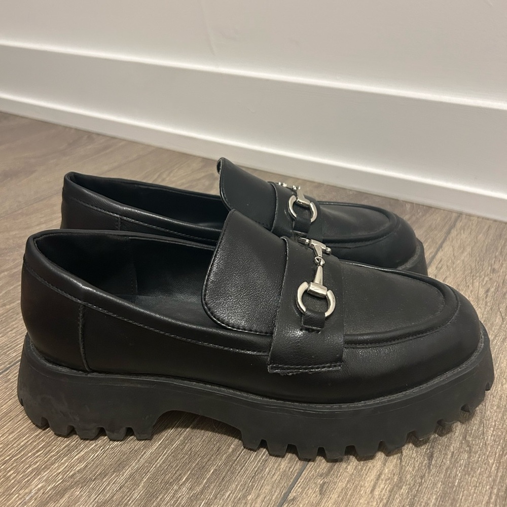 Call it spring black loafers